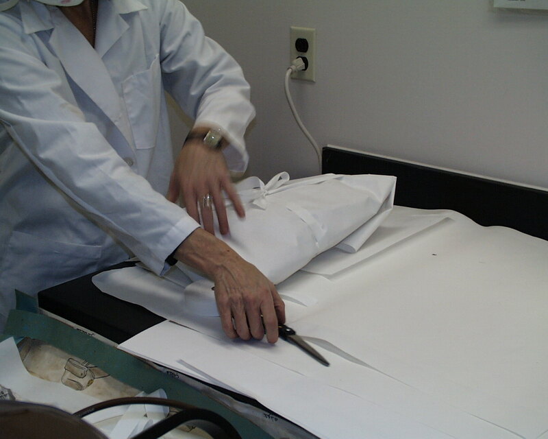 ija-wrapping-a-book-in-acid-free-paper — page 1 · Iraqi Jewish Archive (NARA) · judeoiraq.org