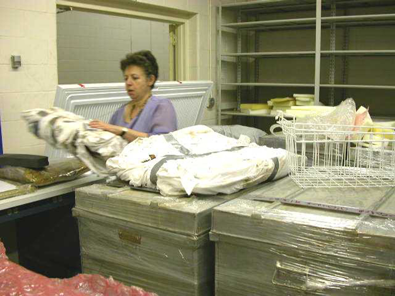 ija-nara-staff-arranges-ija-materials-in-vault-upon-arrival — page 1 · Iraqi Jewish Archive (NARA) · judeoiraq.org
