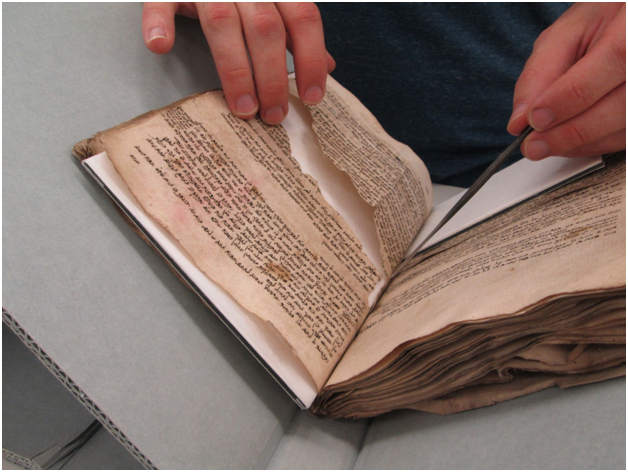 ija-damaged-book — page 1 · Iraqi Jewish Archive (NARA) · judeoiraq.org